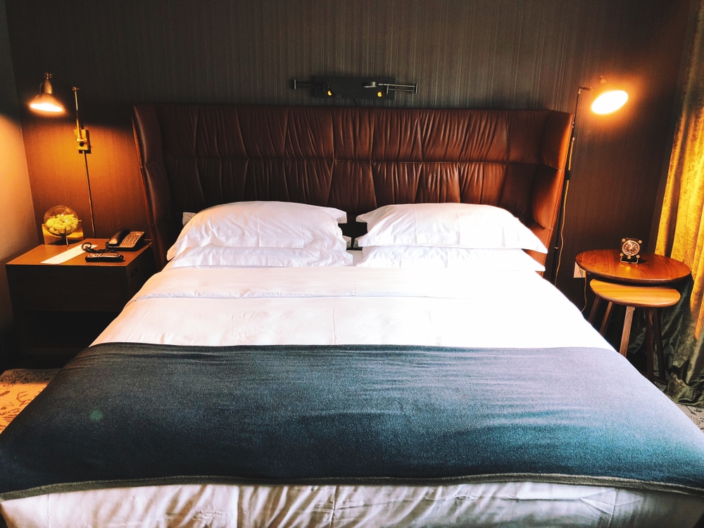 Boston,massachusetts,united,States.october,30th,2018.a,King,Bed,With,Bedside,Lamp,Light,In