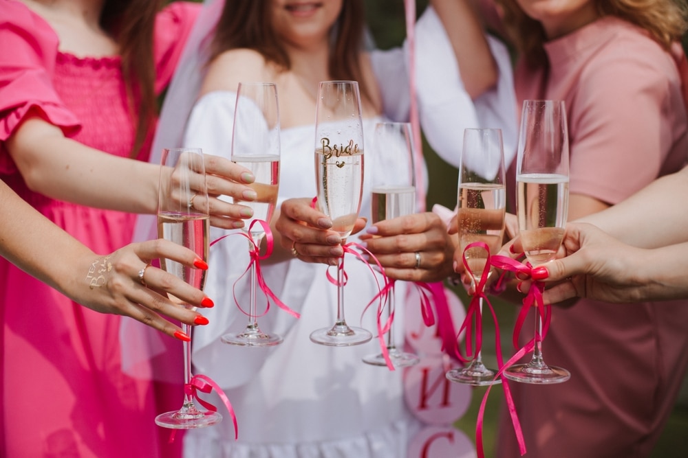 Bridal,Party,,Bachelorette,Party,,Champagne,Glasses,In,Women's,Hands